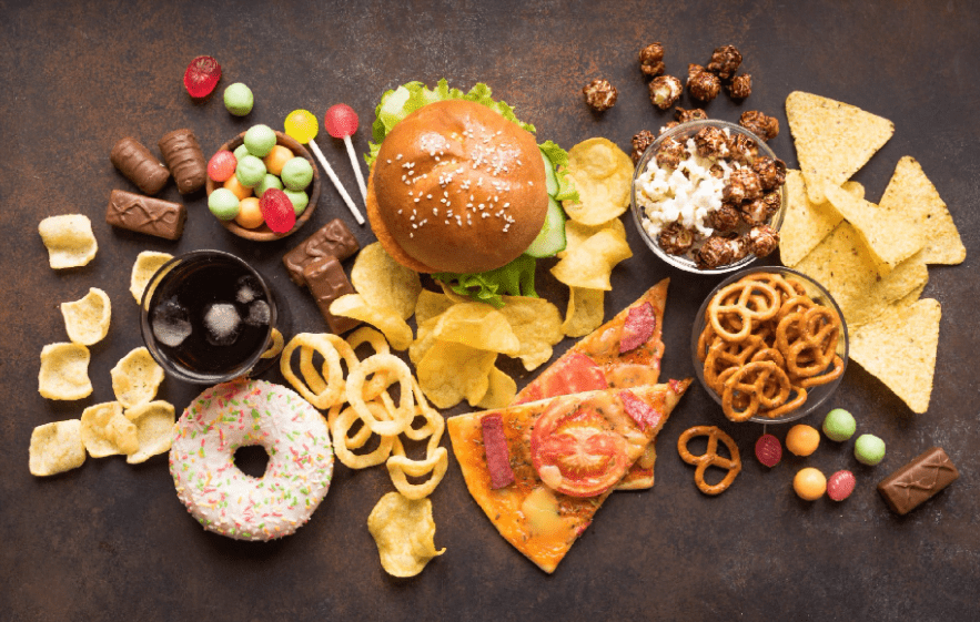 Afbeelding met Snack, voedsel, bakwaren, Fastfood Automatisch gegenereerde beschrijving